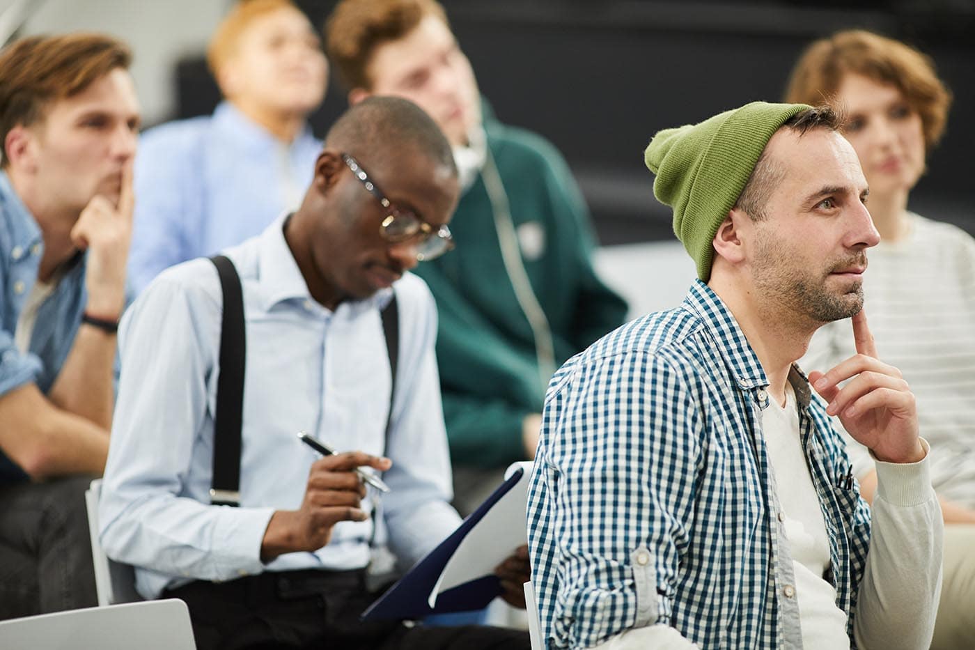 pensive-multiethnic-students-at-conference-FWY5MVU.jpg